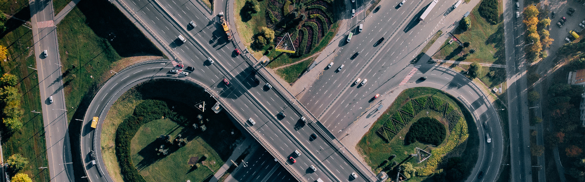 Interchange of roads and green areas in between.